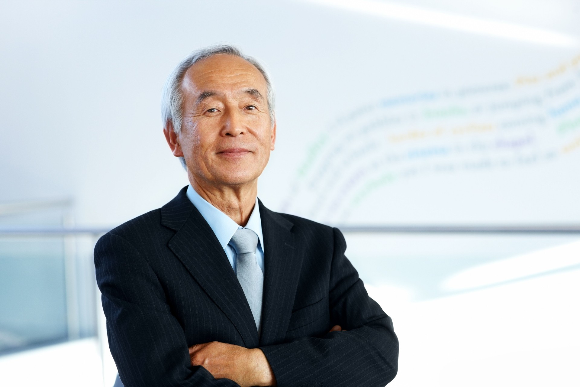 Confident senior Japanese entrepreneur